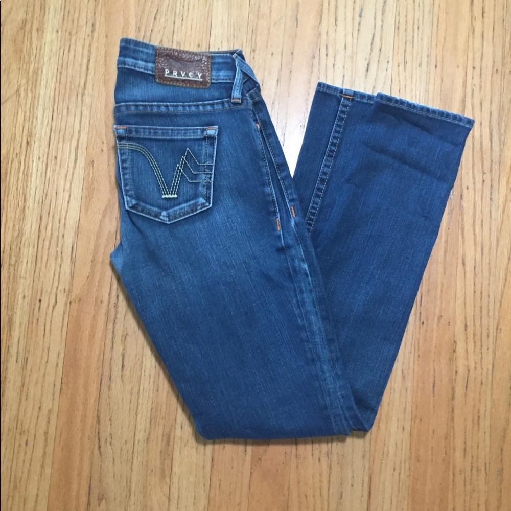 PRVCY denim jeans.